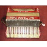 A Pietro bellows-driven accordion, width 48cm