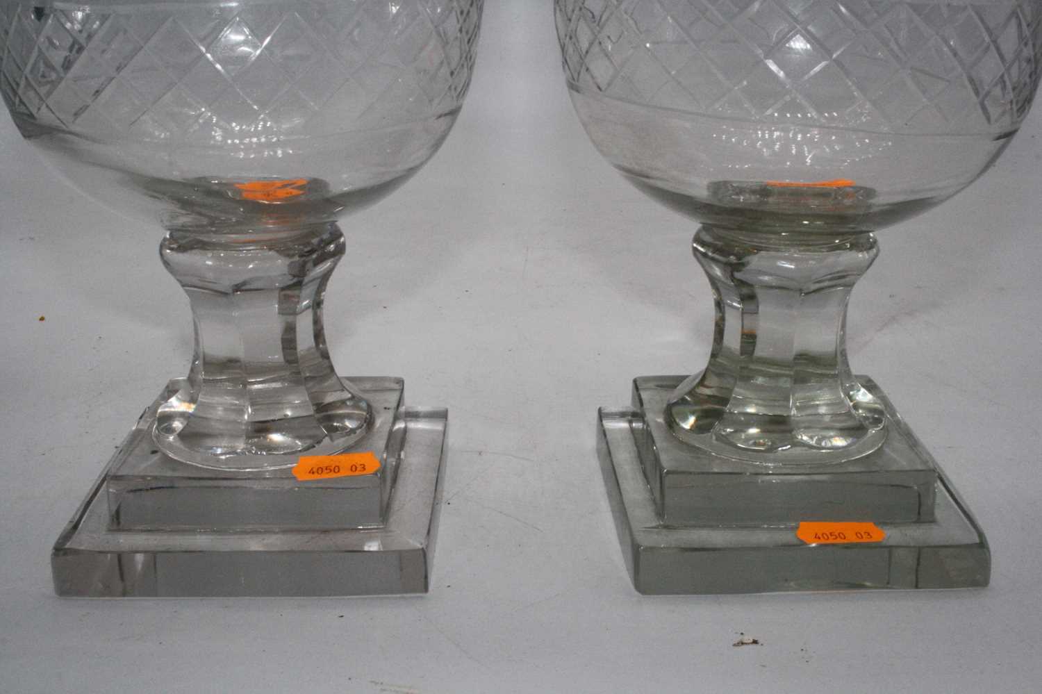 A pair of cut glass hurricane lamps, each upon a faceted stem and square stepped plinth, height - Image 6 of 6