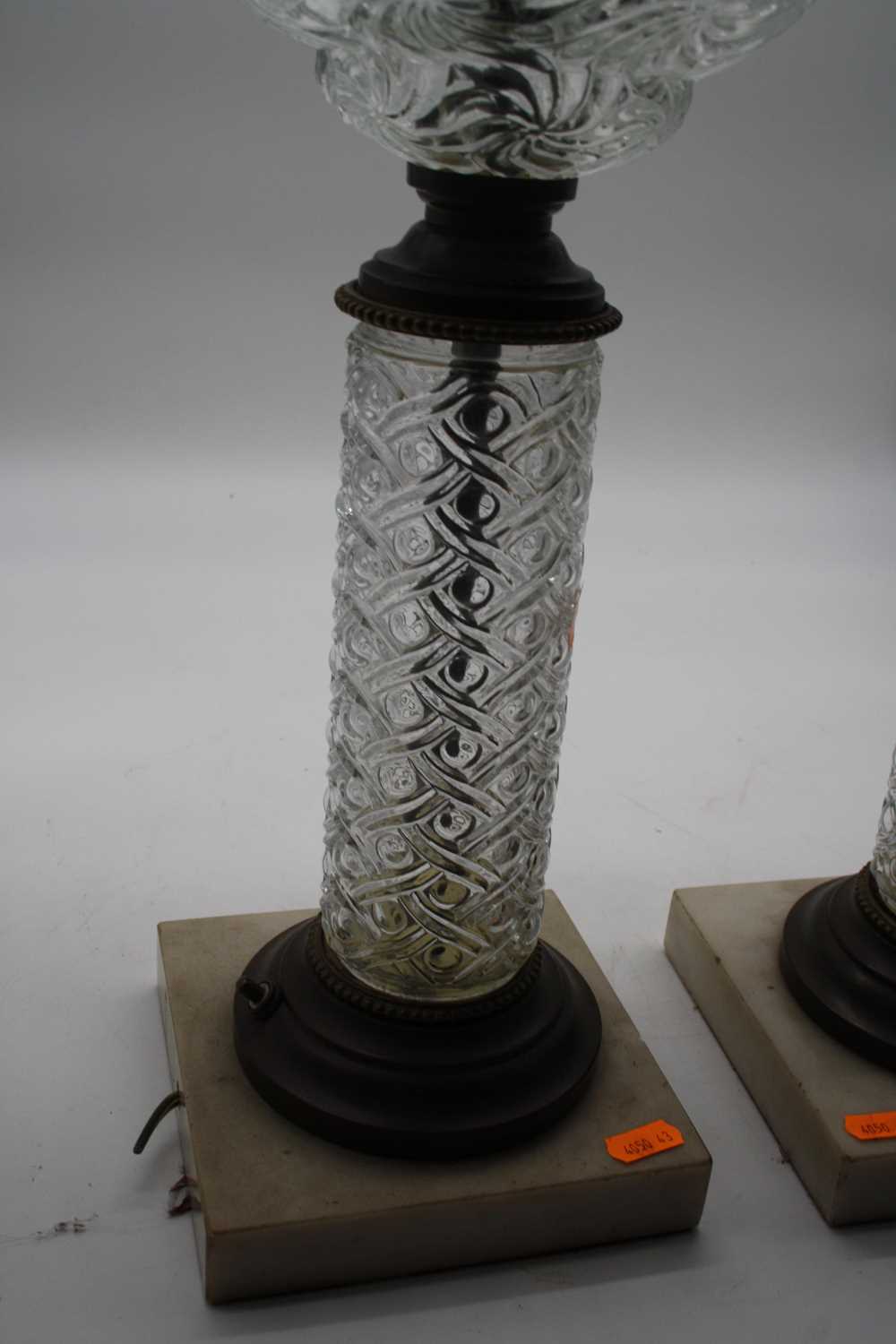 A pair of converted pressed glass oil lamps, each mounted upon a polished hardstone plinth, height - Image 7 of 7