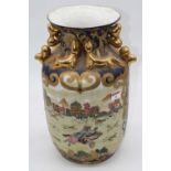 A 20th century Japanese porcelain vase, decorated with a hunting scene and heightened in gilt,