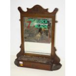 A 20th century mahogany advertising mirror, inscribed 'Clock blade double edged' height 64cm