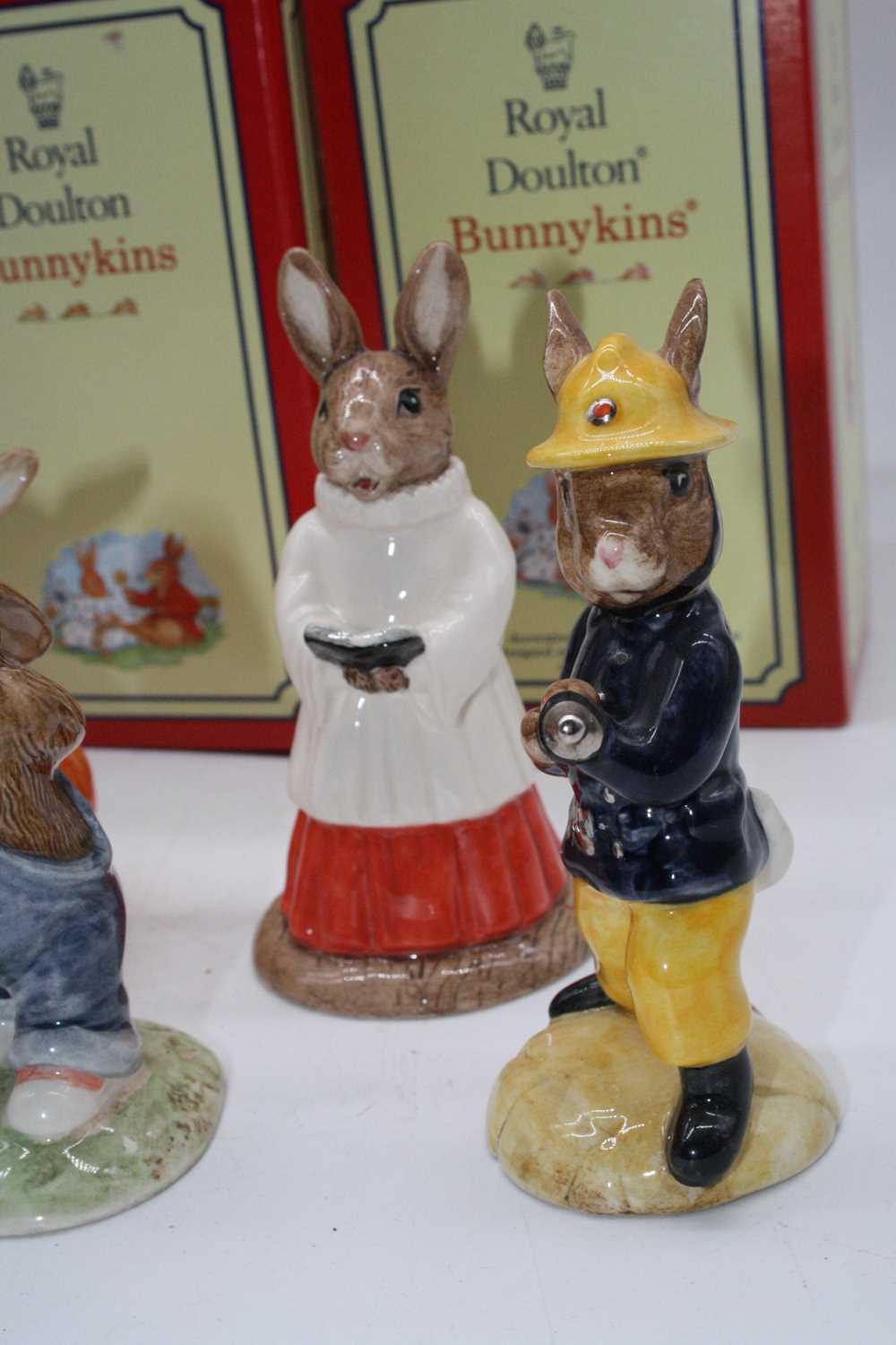 A collection of Royal Doulton Bunnykins figures to include Choir Singer, and Fireman, the largest - Image 6 of 7