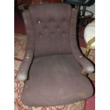 A Victorian buttoned upholstered open armchair, raised on turned forelegs, width 65cm