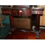 A Victorian mahogany hall table, having twin cushion frieze drawers raised on gun barrel supports to