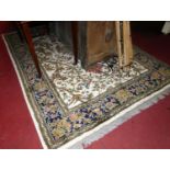 A Persian woollen Kerman cream ground "Tree of Life" rug, 230 x 170cmCondition report: Colours are