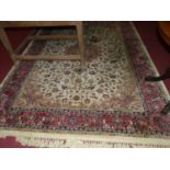 A Persian style machine woven cream ground Tabriz rug, 280 x 202cm