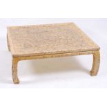 A 1960s seed and yellow resin lacquered low square coffee table, of Kang shape, with slightly