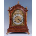 R.H. Halford & Sons, an Edwardian oak cased mantel clock having gilt metal mounts, the silvered