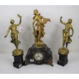 A 19th century French clock garniture, the central marble cased clock with circular enamel dial