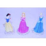 A collection of three Royal Doulton Walt Disney Showcase figurines to include Disney Princesses Snow