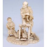 A Japanese carved ivory okimono, modelled as a farmer and his son feeding their chickens, with