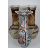 A Japanese Meiji period vase, having a flared rim to a slender neck and teardrop shaped body, enamel