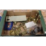 A box of mixed metalware, to include a pair of Victorian brass table candlesticks