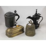 A 19th century continental pewter tankard, Eastern coffee pot, brass tobacco box, and brass cow bell