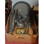 A box of miscellaneous metalware, to include pewter charger, turned brass fire tools, brass