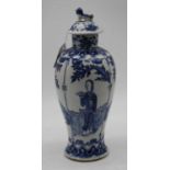 A Chinese export blue and white vase and cover, underglaze blue decorated with scholars, birds