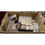 Two boxes containing a large collection of cigarette and other collectors' cards