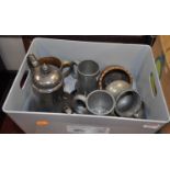 A box of miscellaneous metalware, to include 19th century copper tankard, pewter tankard etc