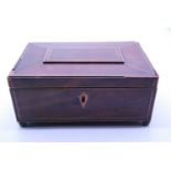 A Regency mahogany and satinwood strung ladies workbox of sarcophagus form having leaf cast ring