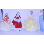 A collection of four Royal Doulton figures to include Pretty Ladies 'Winter' HN5334, 'Autumn'