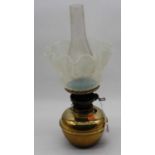 A late Victorian brass oil lamp with chimney, having frilled vaseline glass shade, (h.34cm excluding