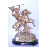 A pair of late 19th century gilt spelter figures of crusaders on horseback, each of naturalistic