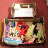 A collection of Sindy dolls and accessories to include wardrobe, easy chair, dressing table, etc