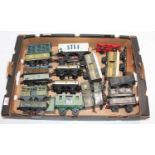 Large tray containing 20, 0 gauge assorted wagons: 4 Bing; 12 Hornby; one French Hornby & 3