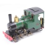 A Roundhouse Models 32mm scale gauge 1 radio-controlled gas-fired 0-4-0 locomotive, finished in dark