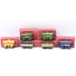 Hornby – 4 tank wagons and two LMS open wagons. 1934-41 Castrol embossed top (E-BVG); 1936-41 Esso