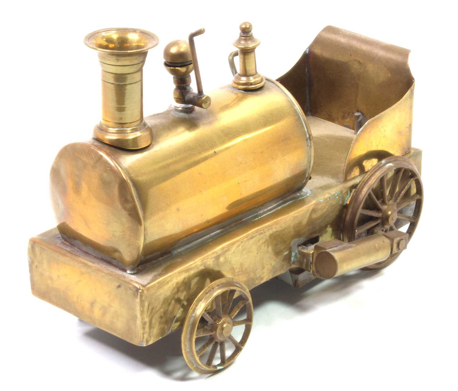 Early 20th-century brass dribbler type locomotive, spirit fired example, with on/off lever, 2 wick