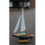 Vic Smeed designed 'Starlet' radio controlled model yacht, with original plans and model stand,