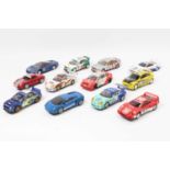 12 various unboxed Scalextric slot cars to include, Subaru Impreza, Porsche Boxter, Audi Quattro,