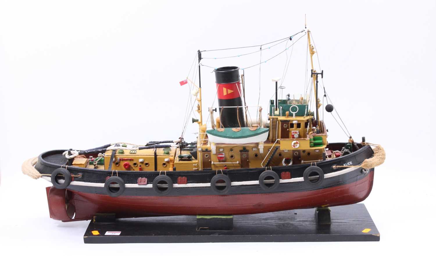 A wooden and GRP hulled radio-controlled model of a single propeller Tug Boat named Alice,