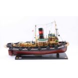 A wooden and GRP hulled radio-controlled model of a single propeller Tug Boat named Alice,