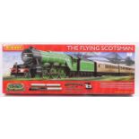 Hornby R1167 ‘Flying Scotsman’ Train Set containing loco of same name with three teak coaches,