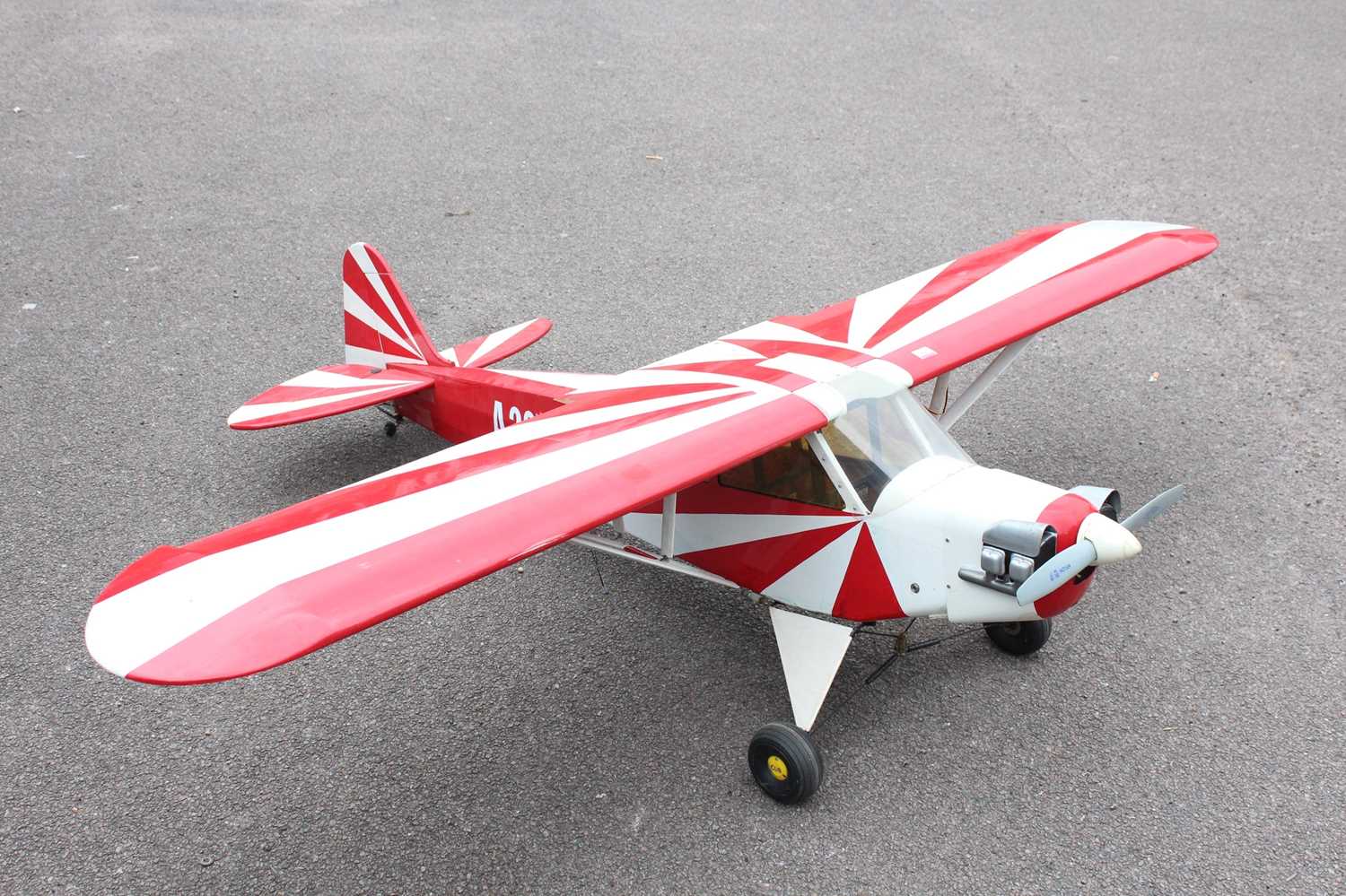 A very well made kit-built radio controlled and four stoke model aircraft, constructed from balsa
