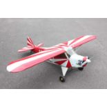 A very well made kit-built radio controlled and four stoke model aircraft, constructed from balsa
