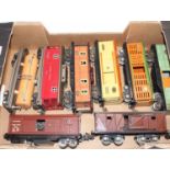 Large tray containing eight Lionel bogie goods wagons with one petrol tank wagon (G-VG)