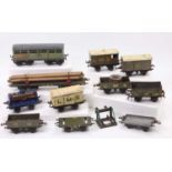 Eleven wagons (10 Hornby & one Bing), all pre-war, includes two bogie wagons, all in need of