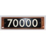 A reproduction cast metal Brittania Class locomotive smoke box number plate, No.70000, mounted on