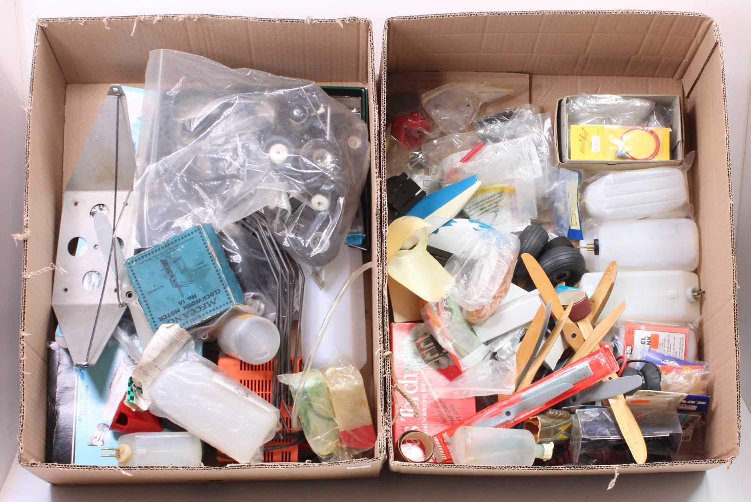 2 boxes containing a large quantity of aircraft model making equipment