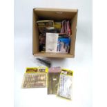 A box of N gauge items: GWR diesel railcar; Walthers Union Pacific diesel 791, EMD GP38-2 with a