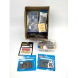 Small box containing various N gauge items: sectional tray containing spare parts, some Peco track