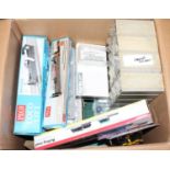 A large box containing: over 50 switches; motor gears & spares; motors, control parts and track