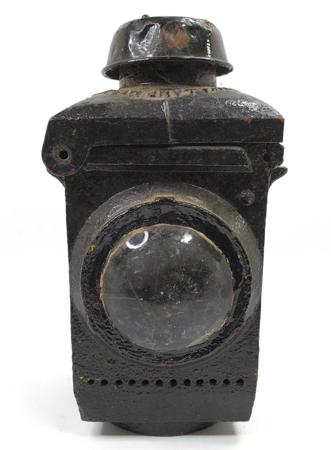 A heavy cast iron LNER gate lamp overpainted in black, missing interior