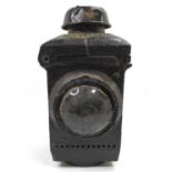 A heavy cast iron LNER gate lamp overpainted in black, missing interior