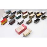 Large tray of 20 Hornby 4-wheel wagons including a couple of tanks, vans, milk & cattle trucks,