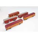 Five Lionel cars: 615 baggage car brown; another red; 613 Pullman car, red; two Railway Post