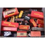 Seventy plus goods wagons of many types and makes. Some Tri-ang, Hornby, Trix, Dublo, Bachmann and